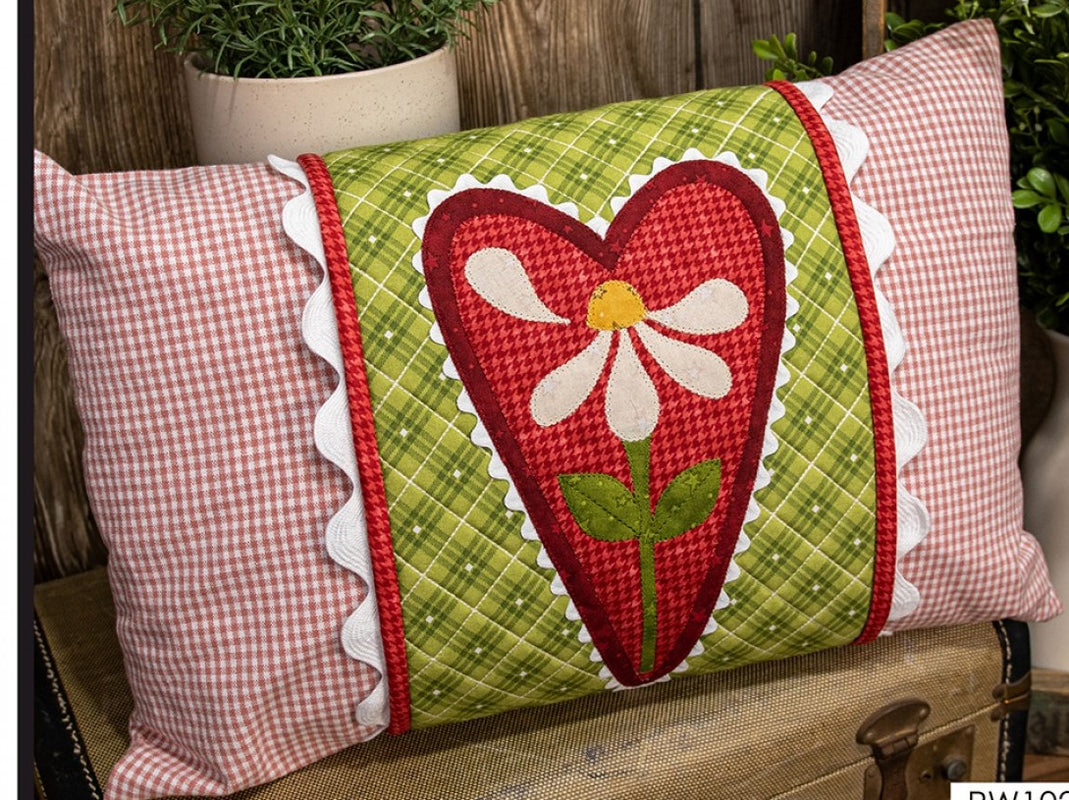 East Aurora Seasonal Pillow Wrap Valentine s 1.26.24